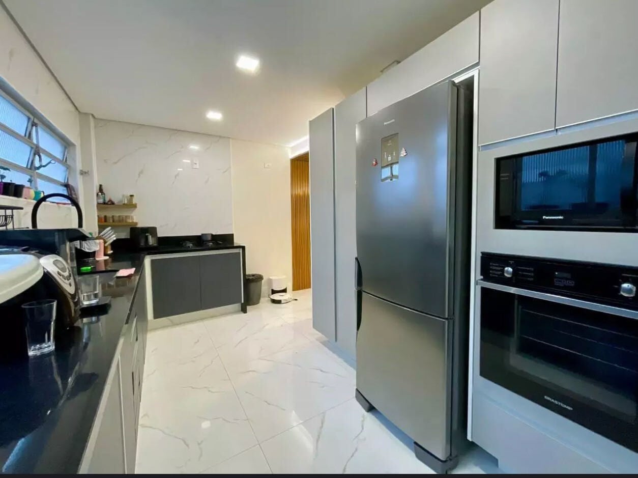 Apartamento 32 · 3 dorm. — Cozinha