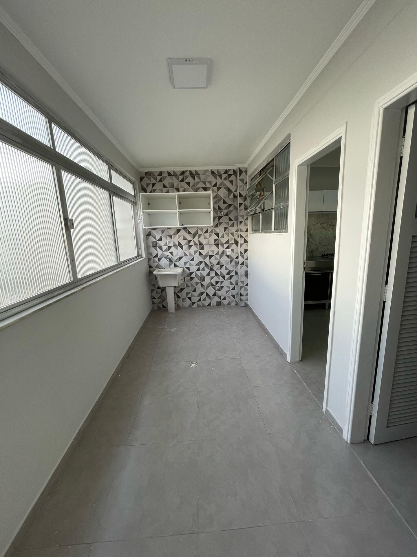 Apartamento 61 · 3 dorm. — Área de serviço