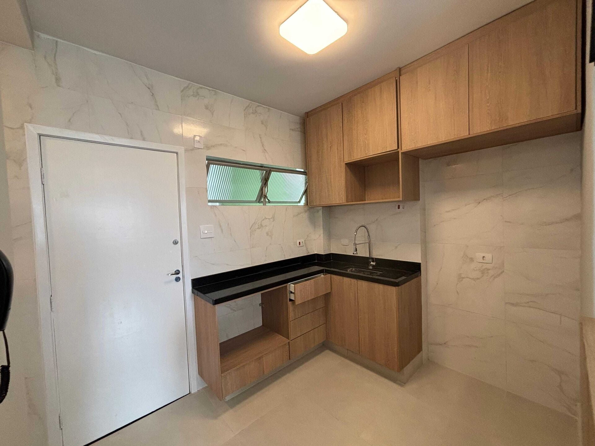 Apartamento 306 · 1 dorm. — Cozinha