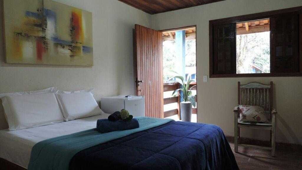Pousada · 14 dorm. — Quarto