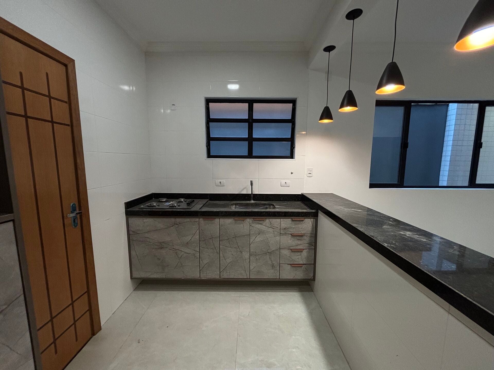 Casa térrea · 3 dorm. — Cozinha