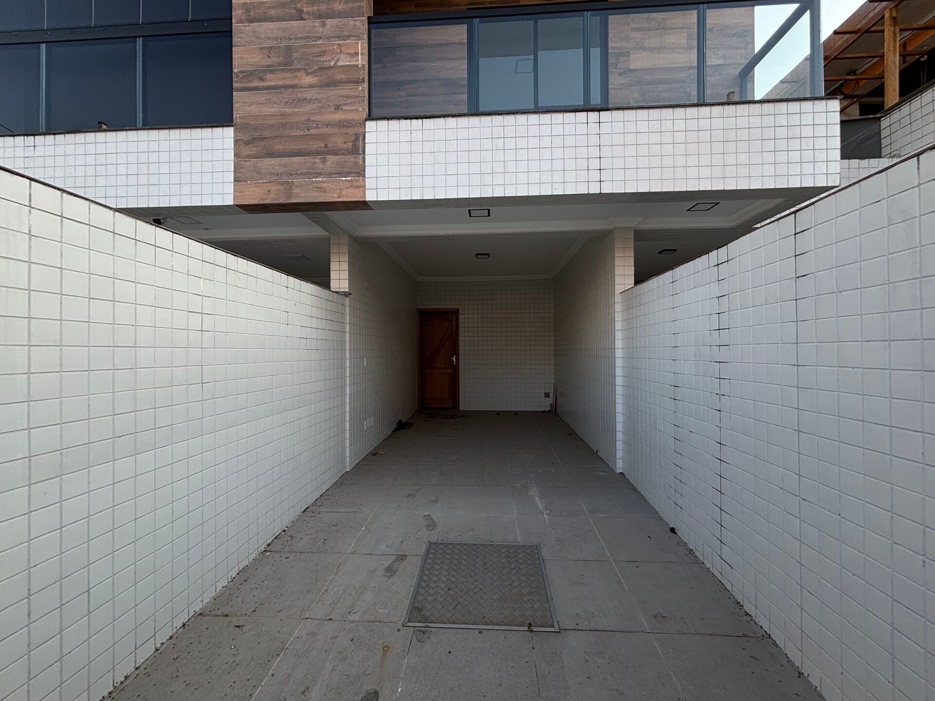 Casa sobreposta 1 · 3 dorm. — Fachada