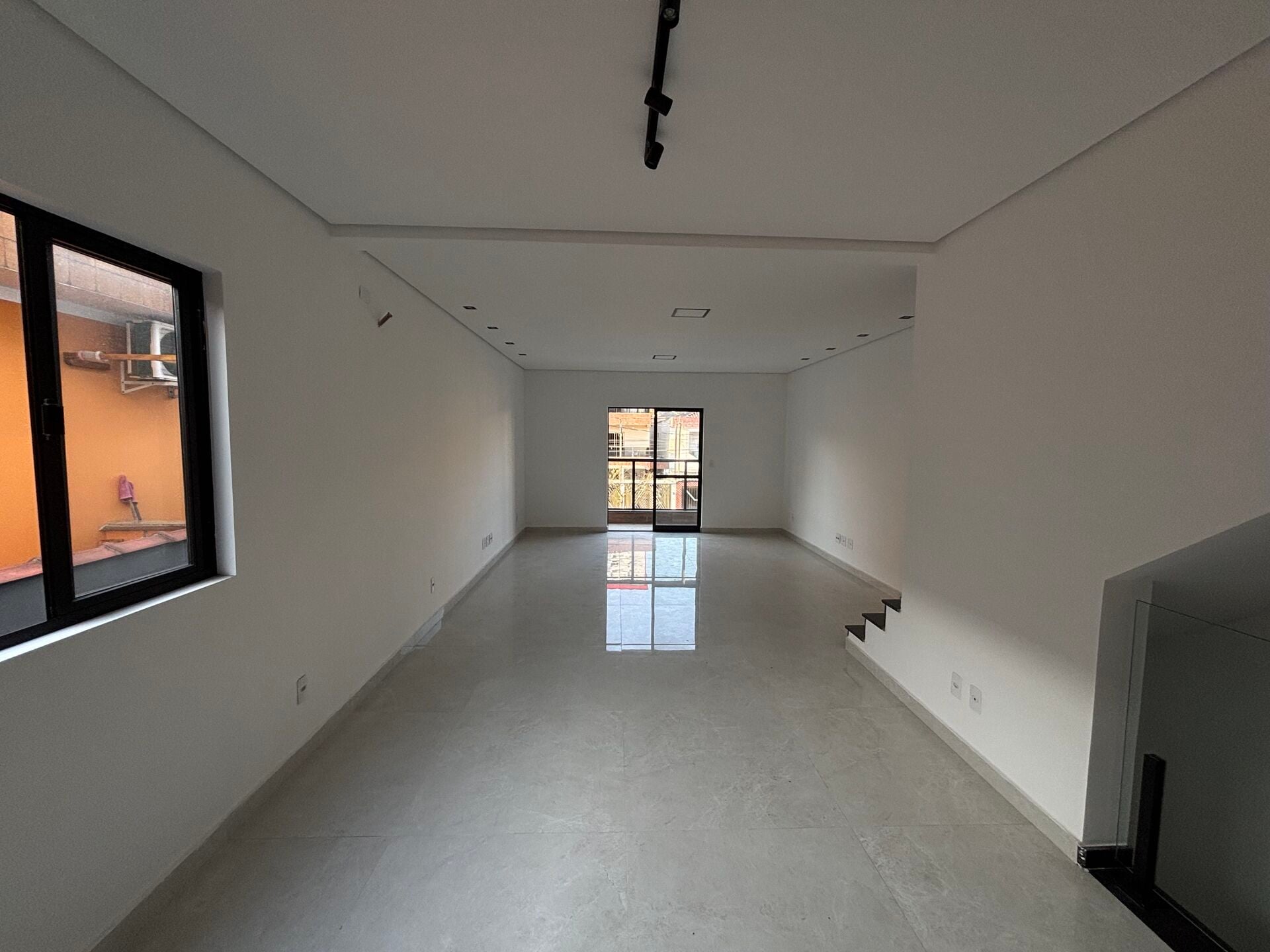 Casa sobreposta 1 · 3 dorm. — Sala