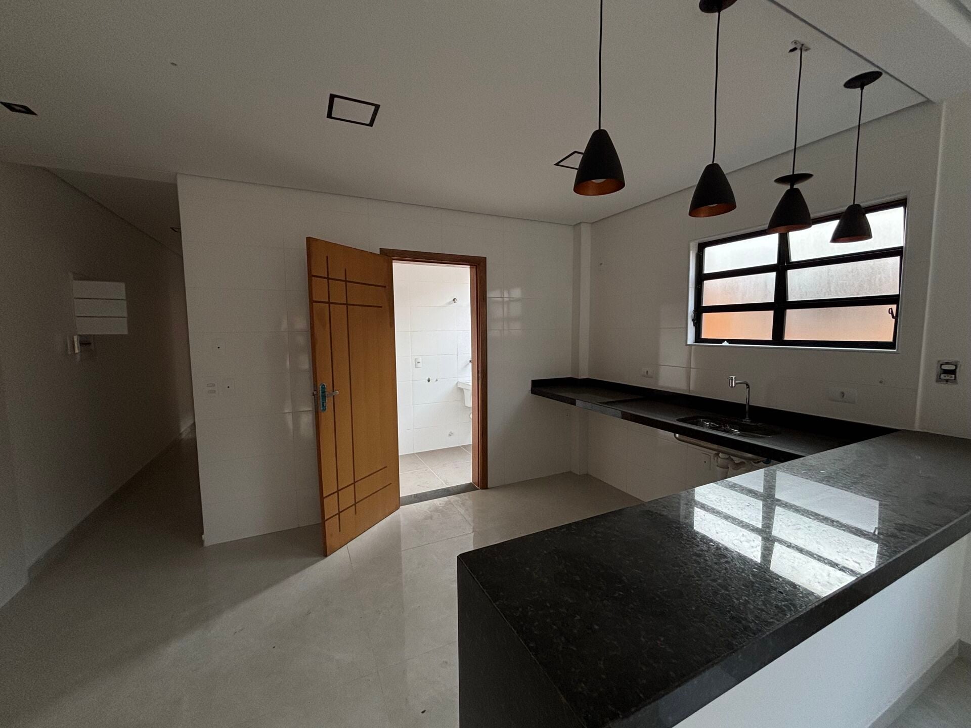 Casa sobreposta 1 · 3 dorm. — Cozinha