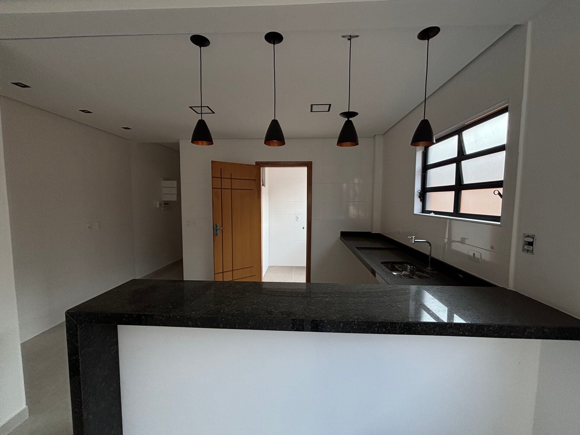 Casa sobreposta 1 · 3 dorm. — Cozinha