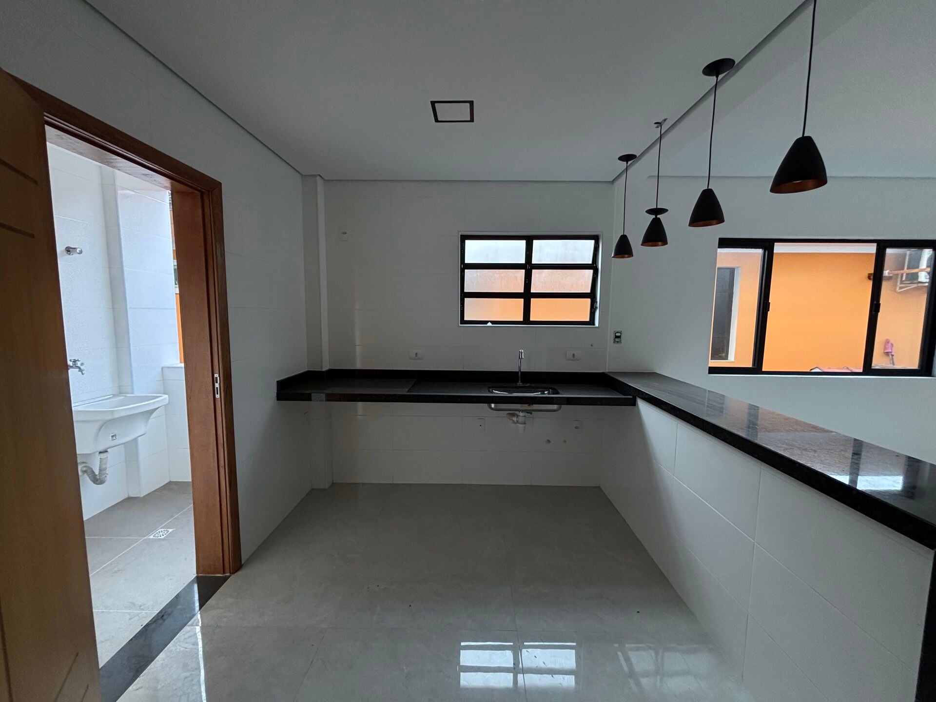 Casa sobreposta 1 · 3 dorm. — Cozinha