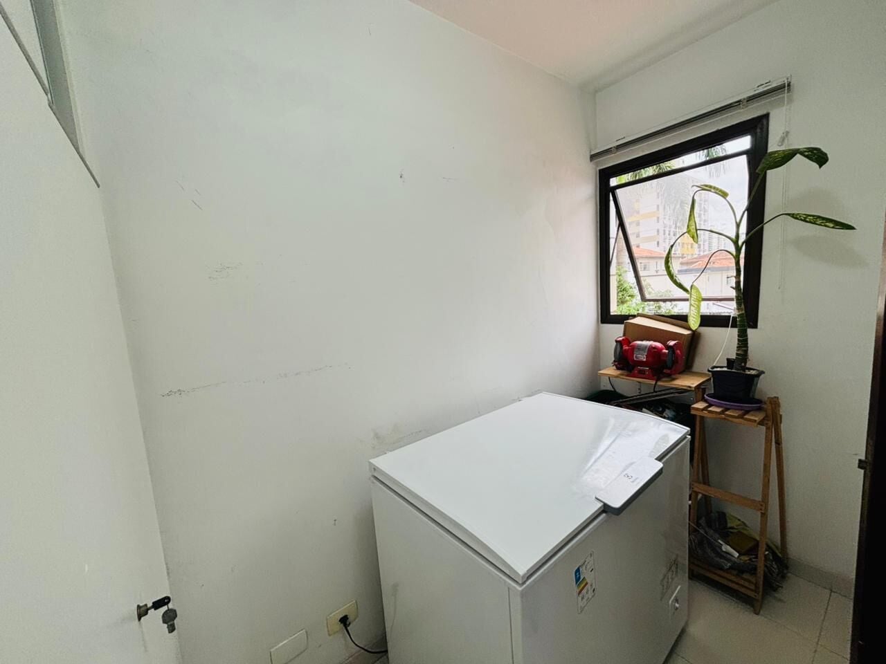 Apartamento 11 · 3 dorm. — Quarto de servico