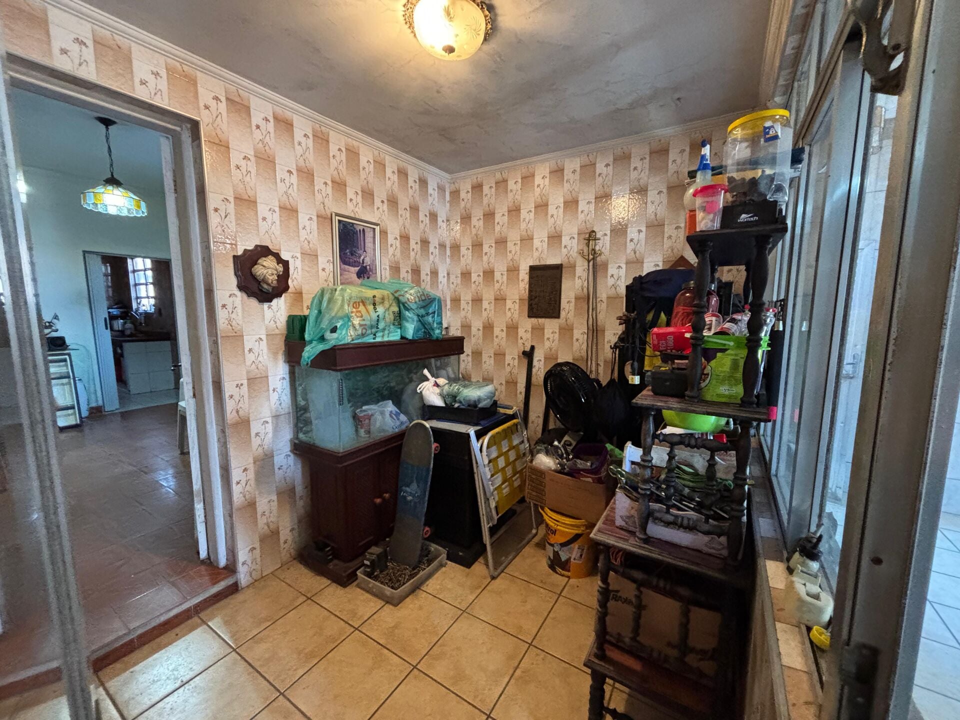 Casa com edícula · 2 dorm. — Sala
