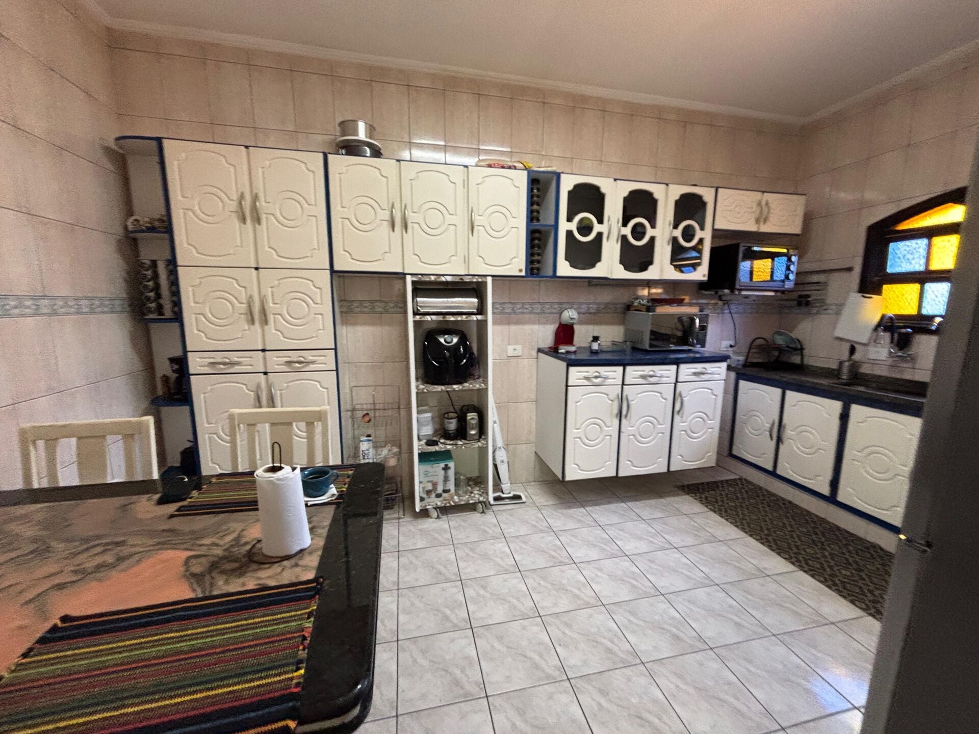 Casa com edícula · 2 dorm. — Cozinha