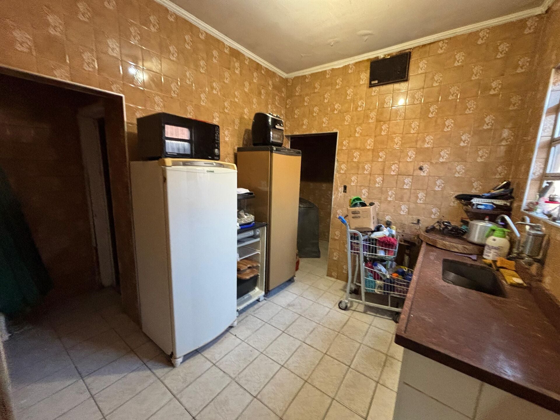 Casa com edícula · 2 dorm. — Cozinha edicula