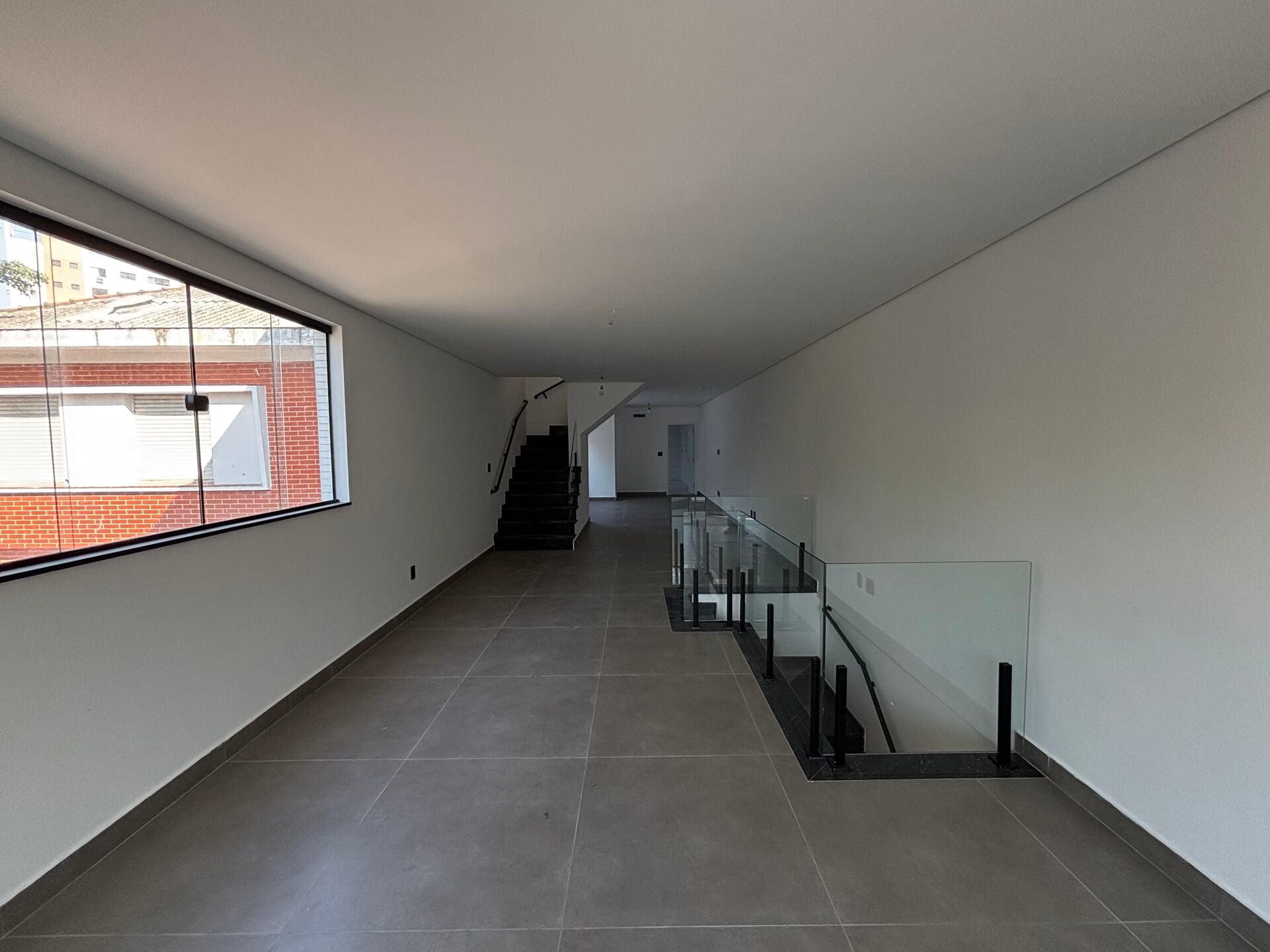 Casa sobreposta · 3 dorm. — Sala