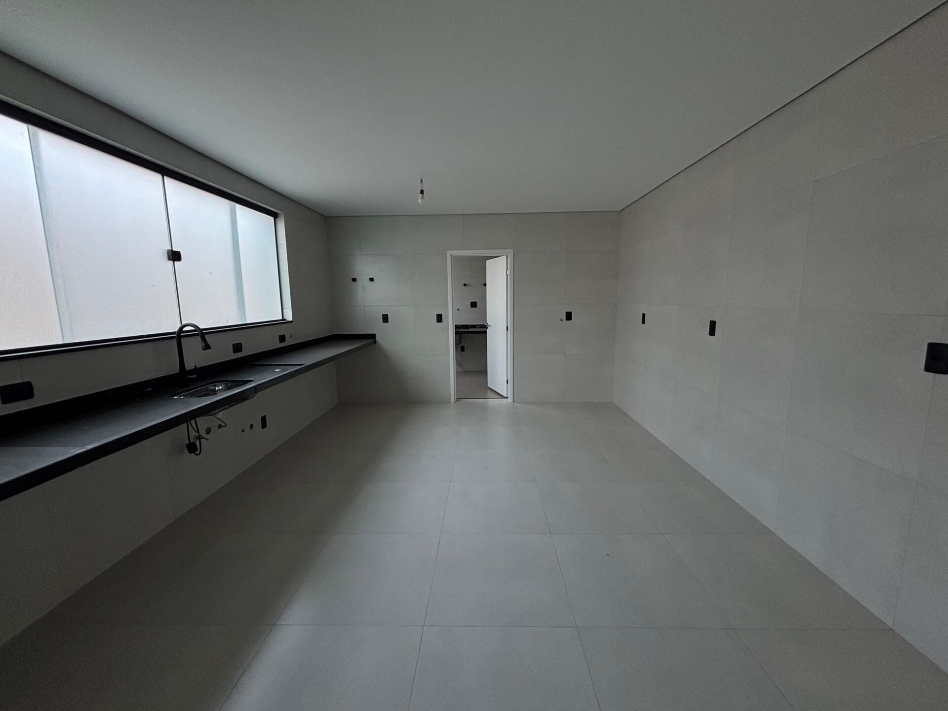Casa sobreposta · 3 dorm. — Cozinha