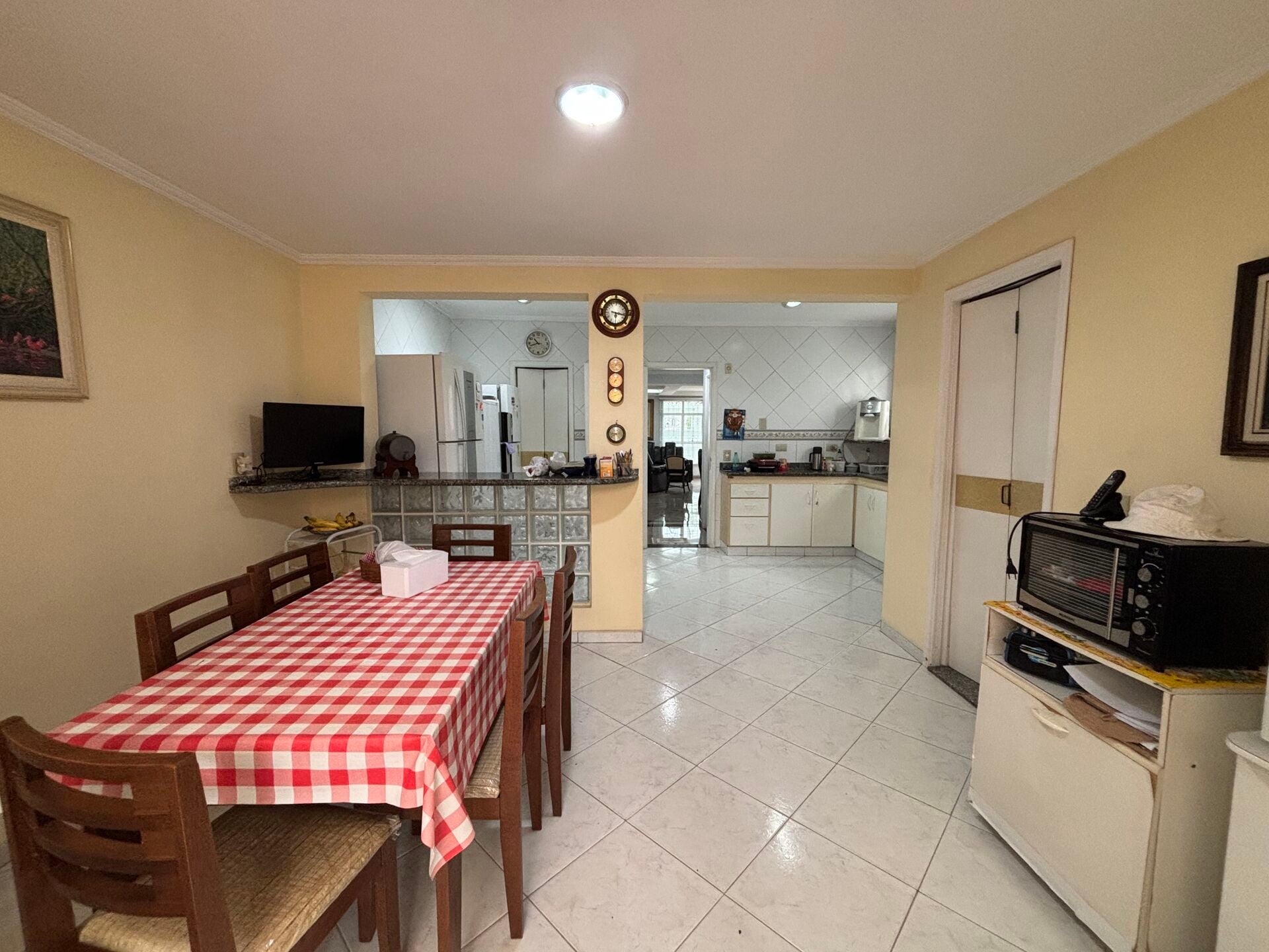 Casa com edícula · 3 dorm. — Cozinha