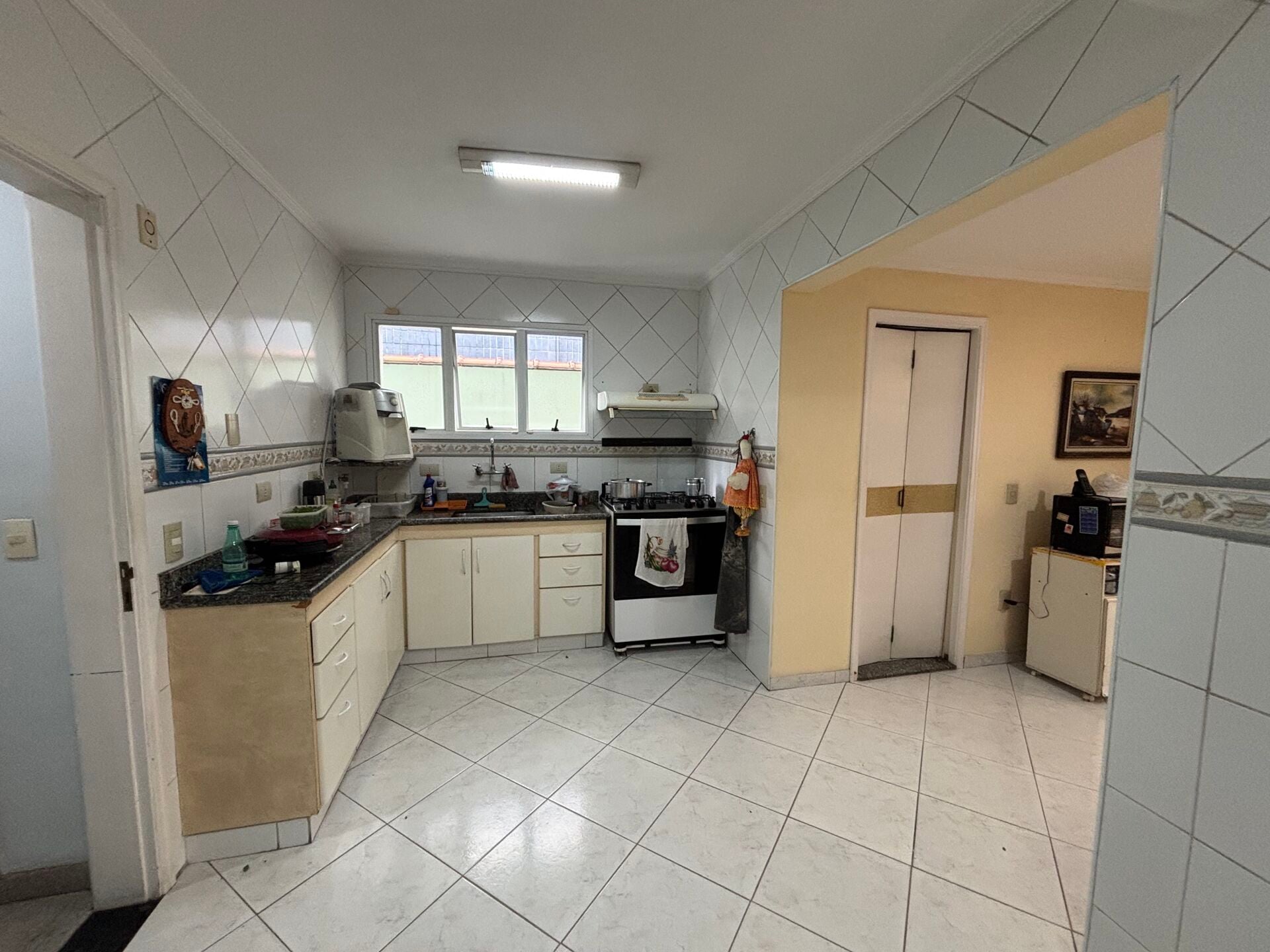Casa com edícula · 3 dorm. — Cozinha