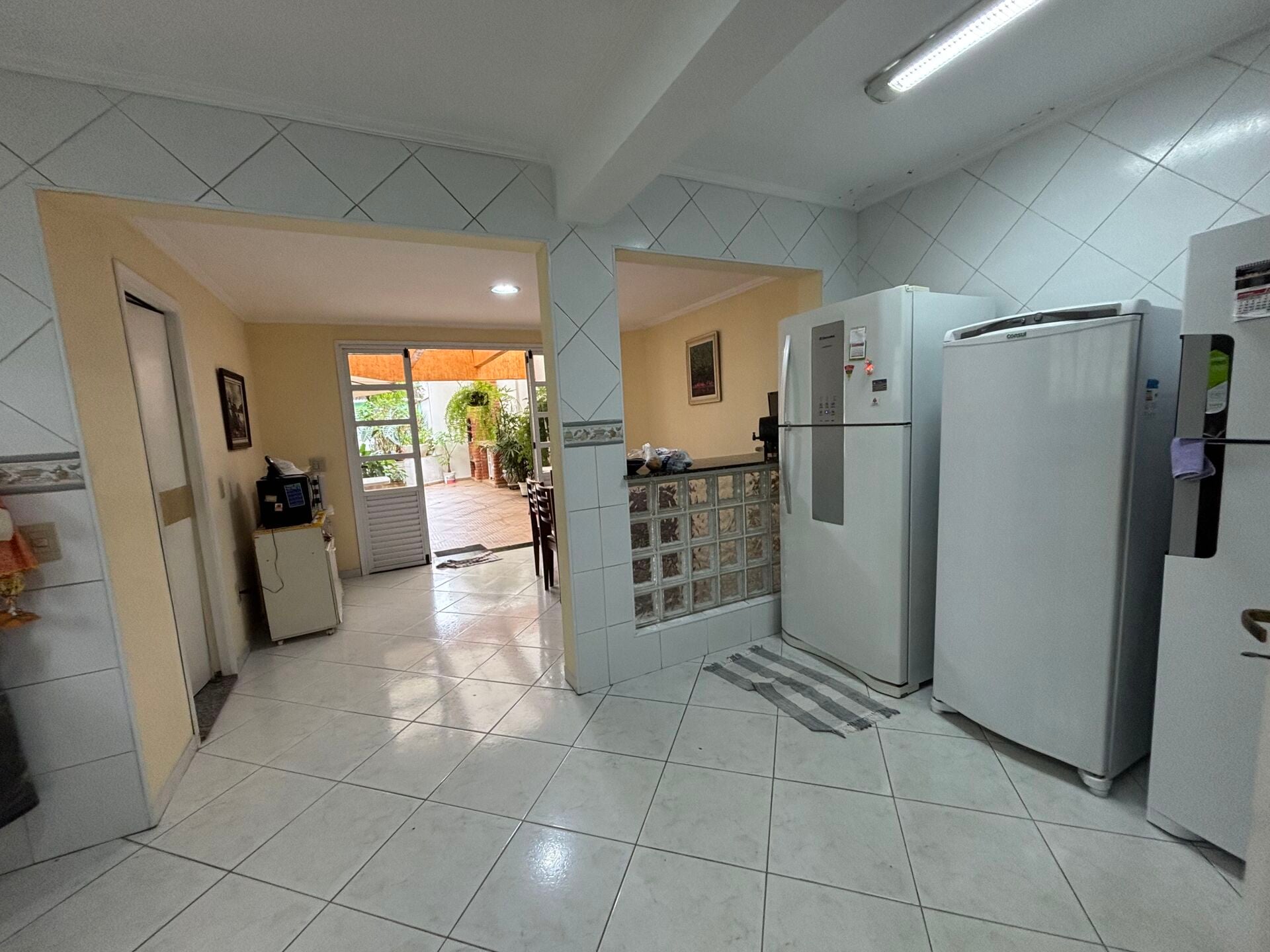 Casa com edícula · 3 dorm. — Cozinha