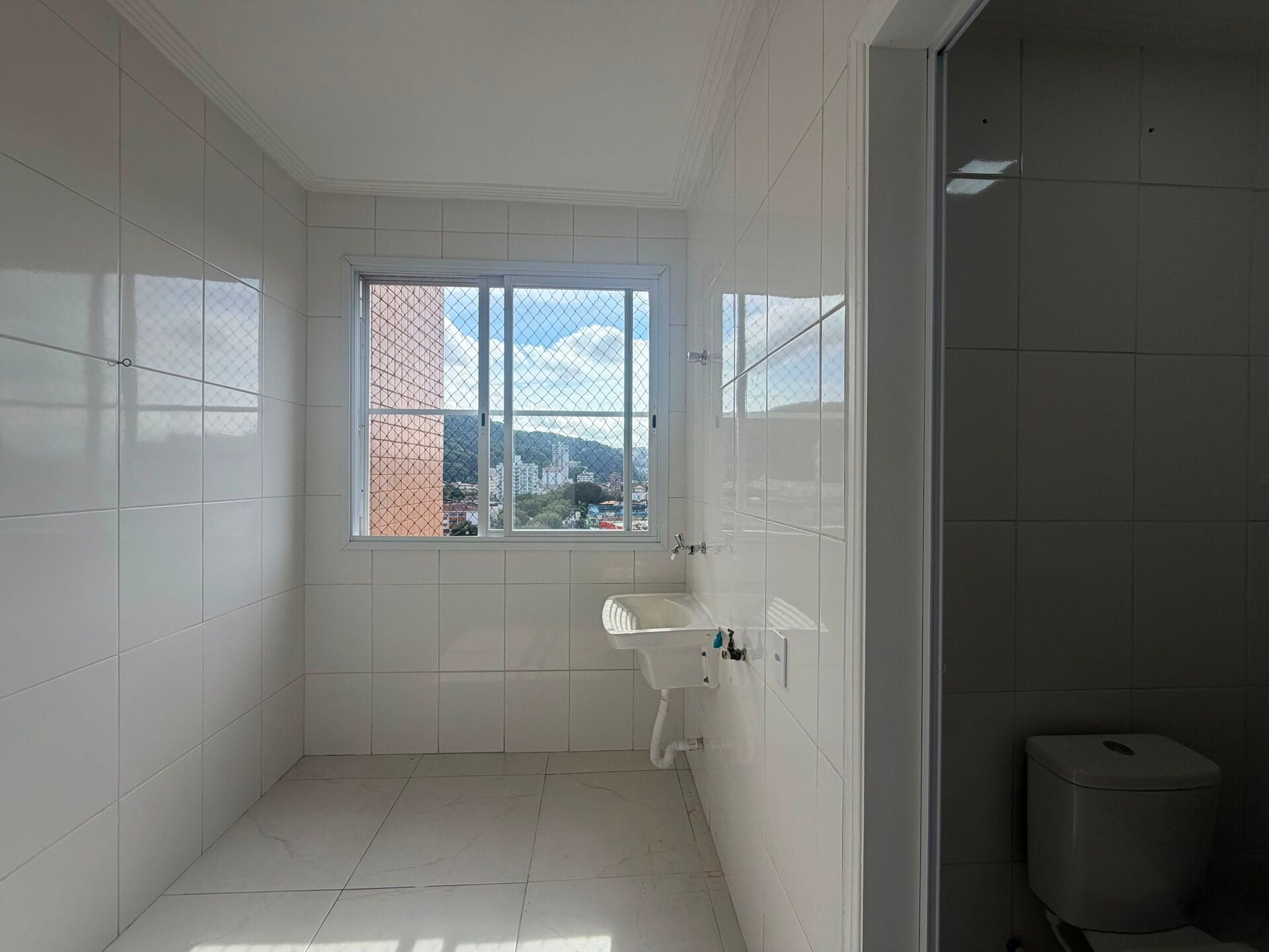 Apartamento · 2 dorm. — Área de serviço