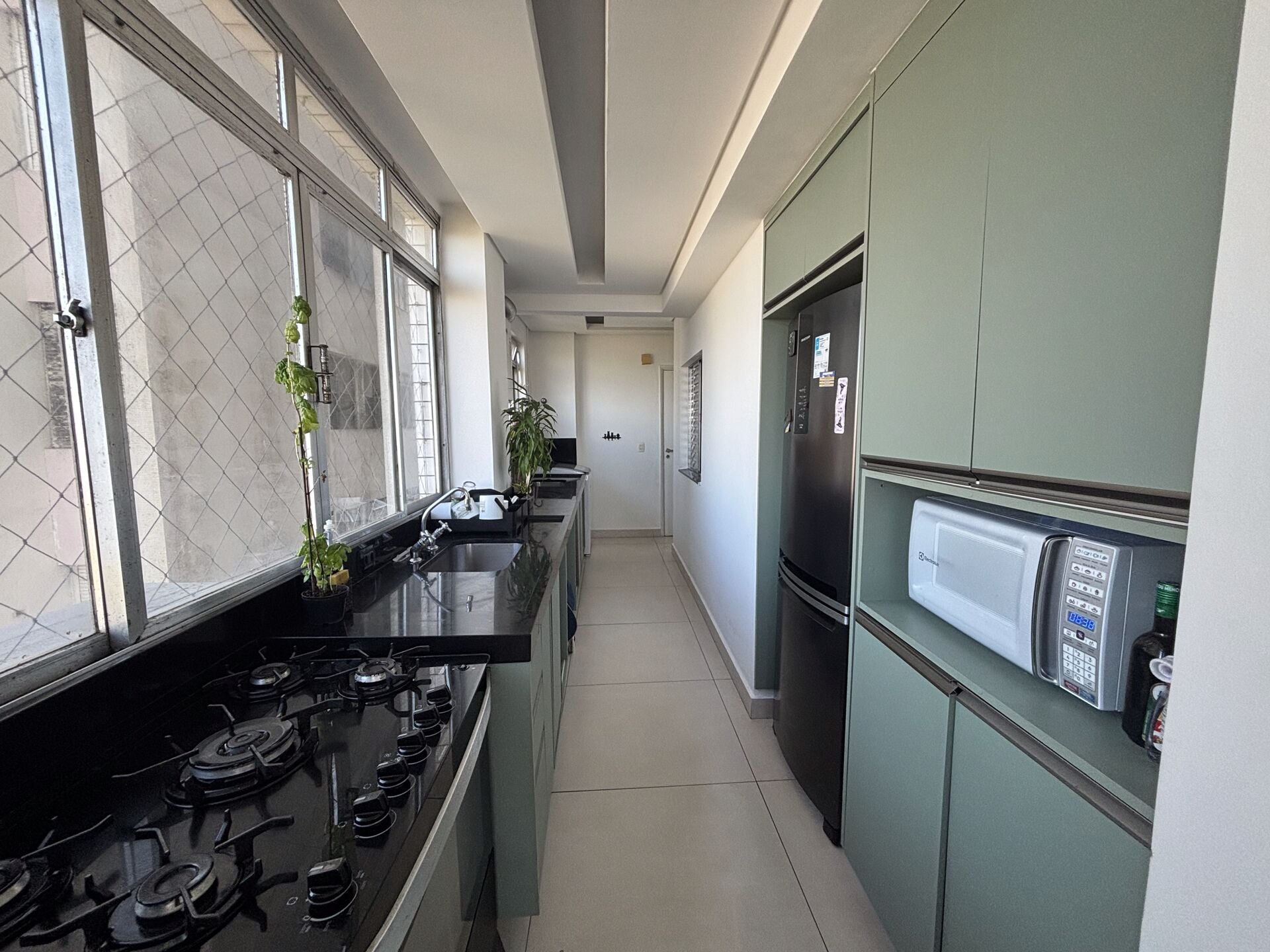 Apartamento · 4 dorm. — Cozinha