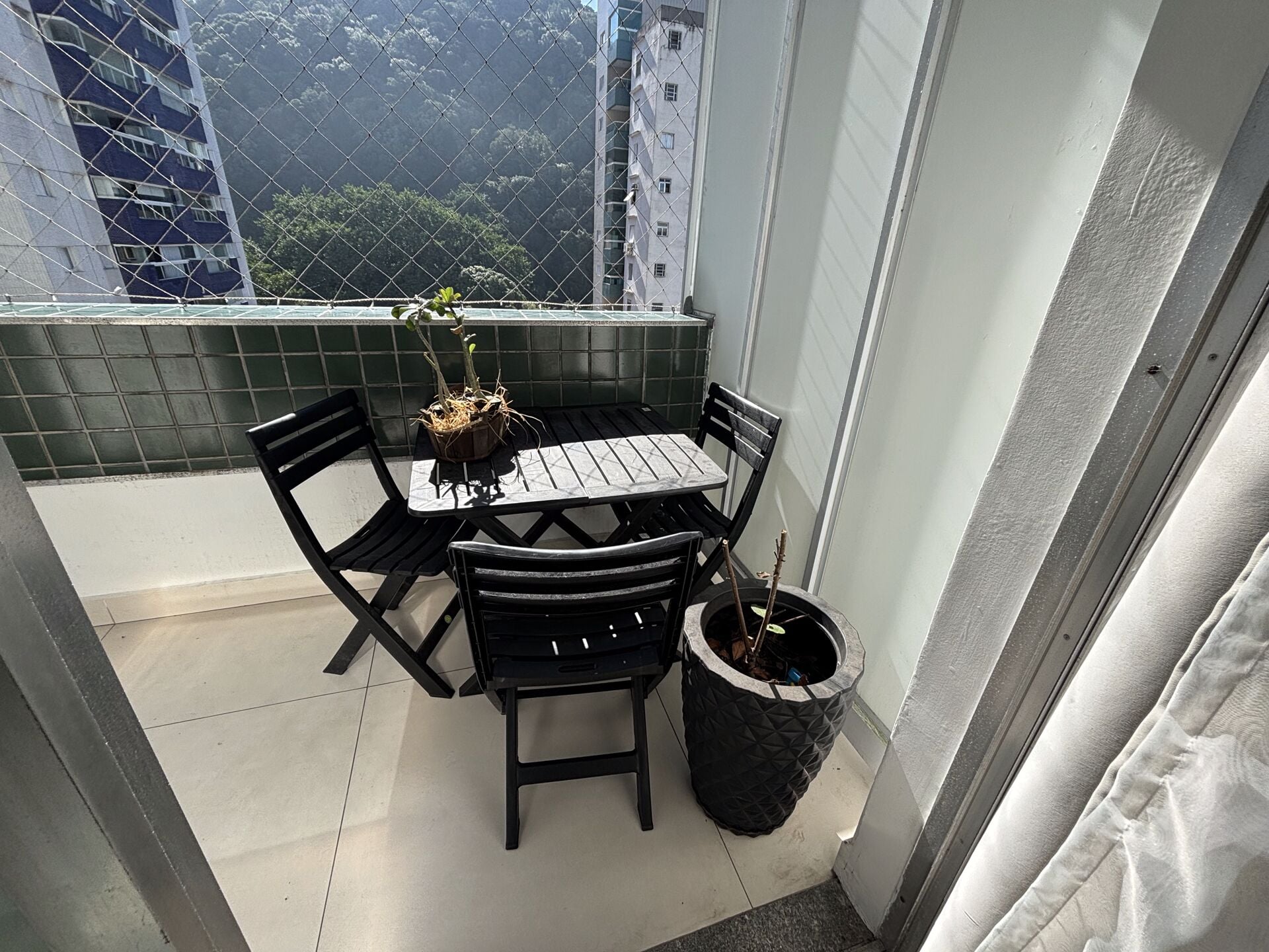 Apartamento · 4 dorm. — Varanda