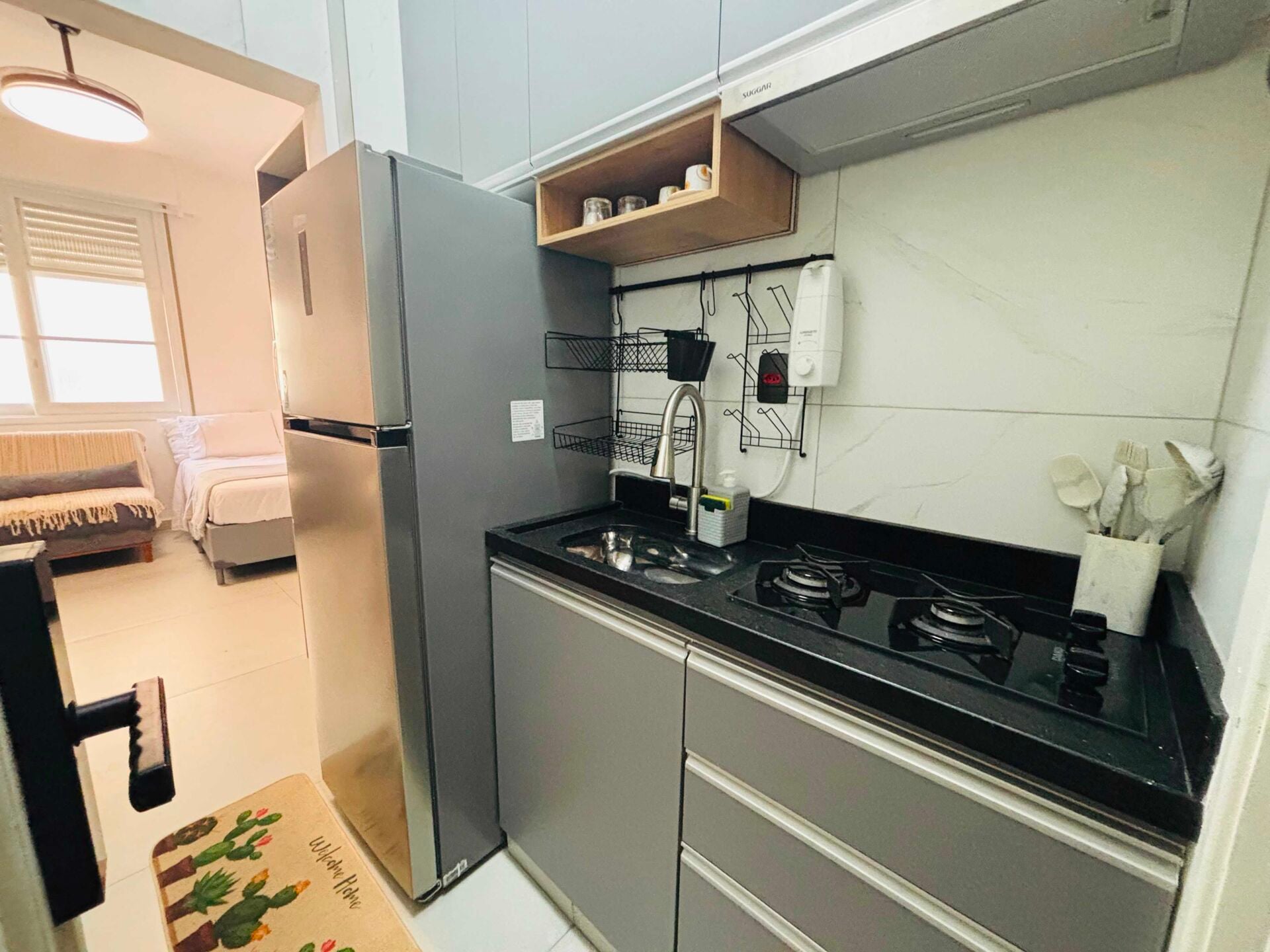 Apartamento · 1 dorm. — Cozinha