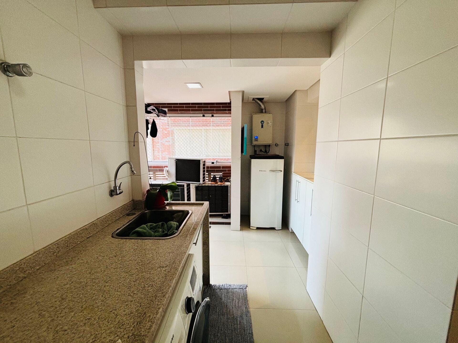 Apartamento · 3 dorm. — Área de serviço